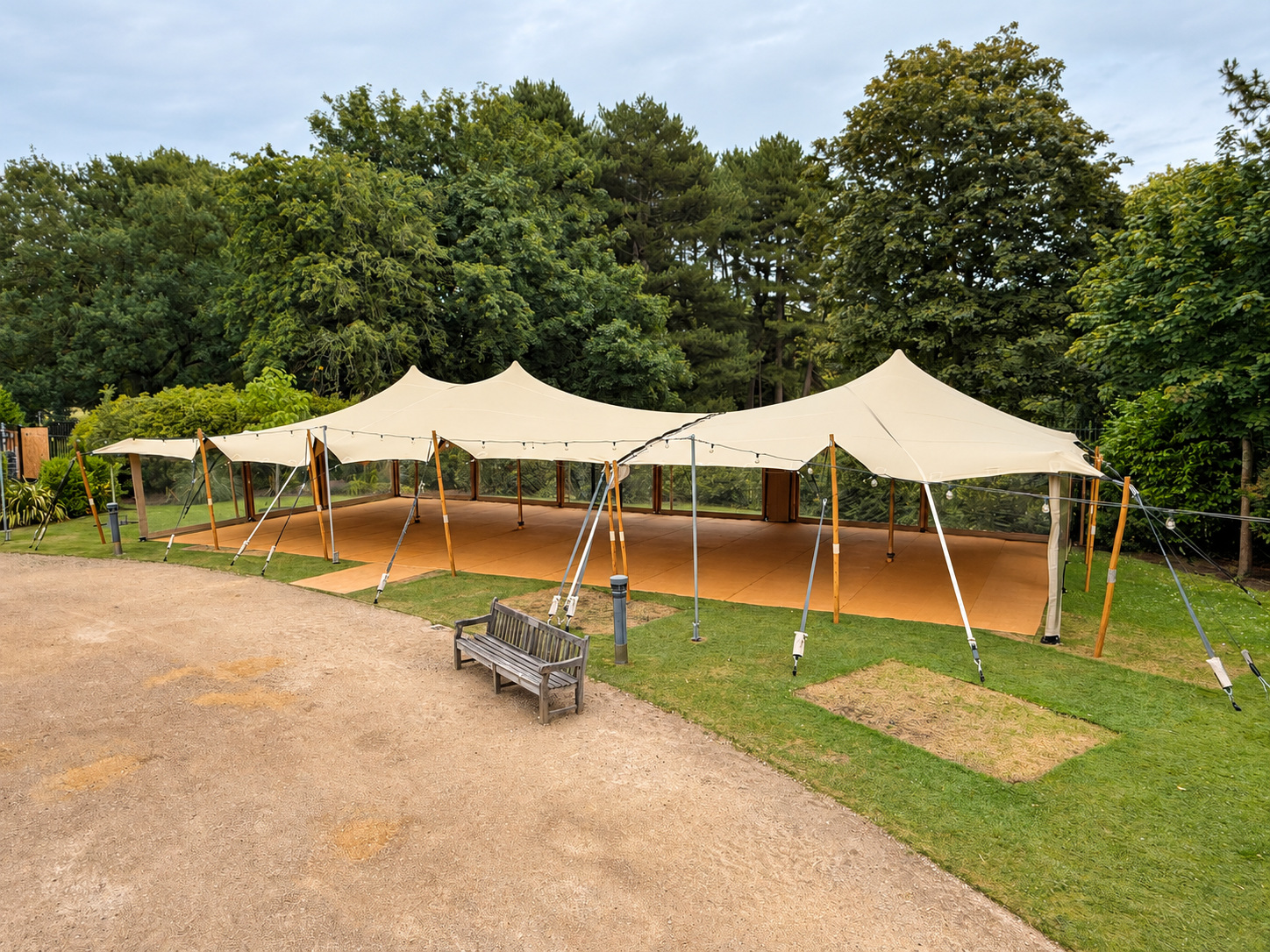 Multiple stretch tents linked across a large event site